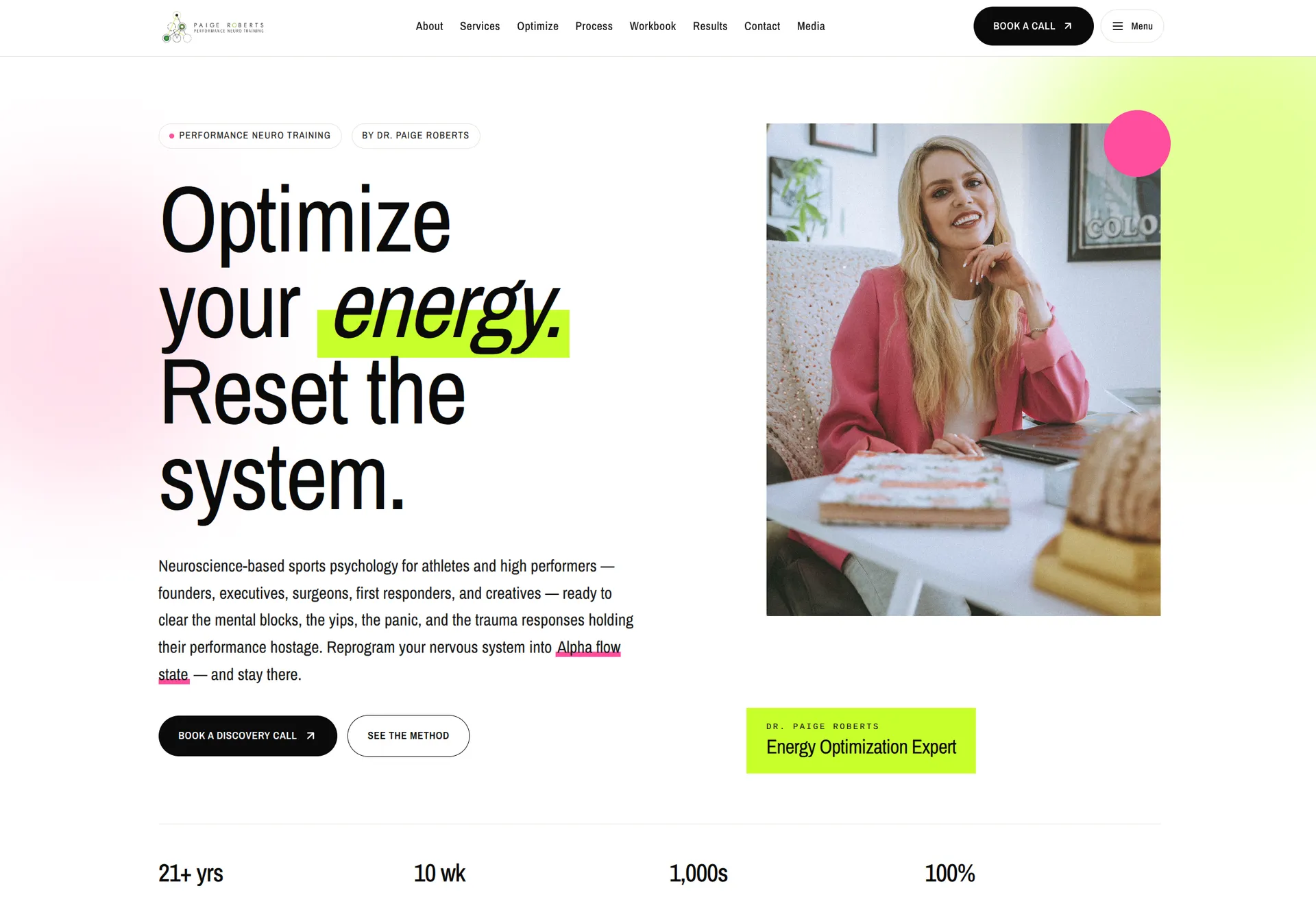 Homepage for a performance neuro training coach with a bright "Optimize your energy. Reset the system." headline, neon green highlights, and a photo of Dr. Paige Roberts